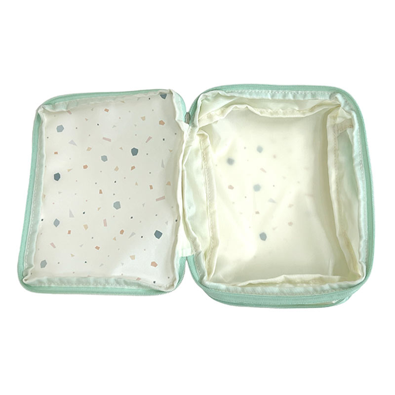 おむつ替え応援 ぎゅっと ちぢまる おむつポーチ ピスタチオ グリーン