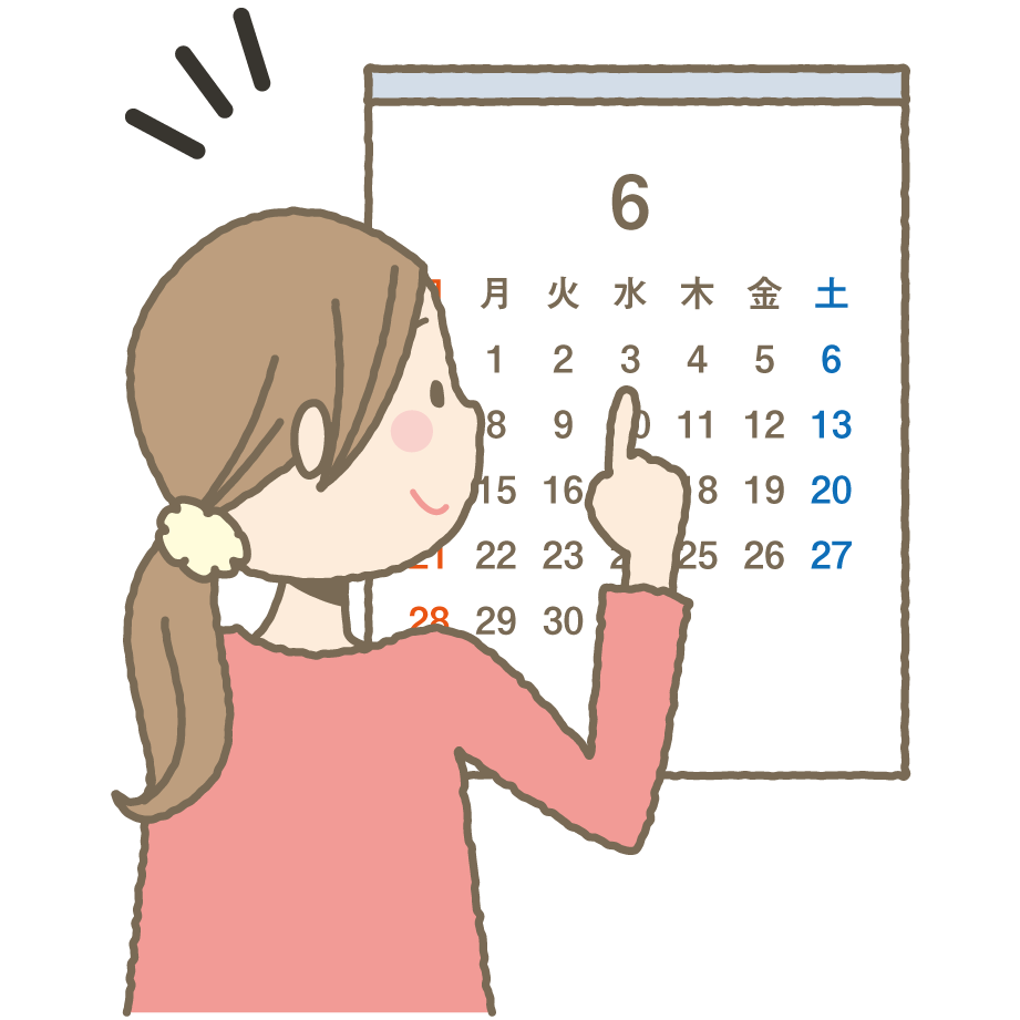 予定帝王切開の日にちをカレンダーで確認する妊婦